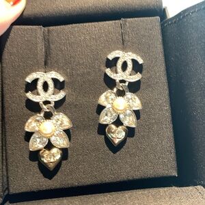 Authentic, limited editionChanel Silver and Gold Flower Earrings, sold out.